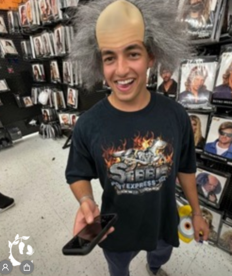 Halloween Costume Shop Shenanigans — Trying on the Mad Scientist Wig