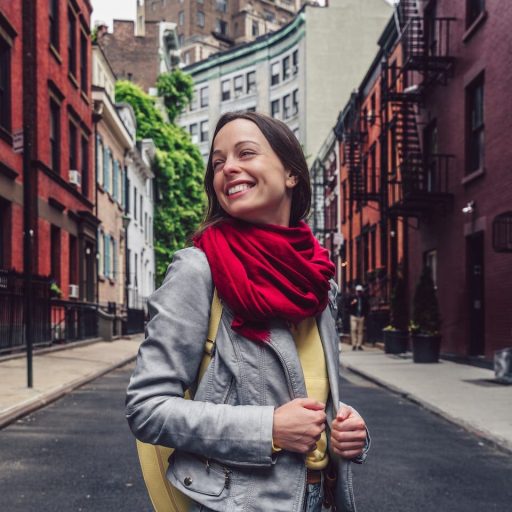 smiling-girl-on-a-famous-street-GFLMX4Z